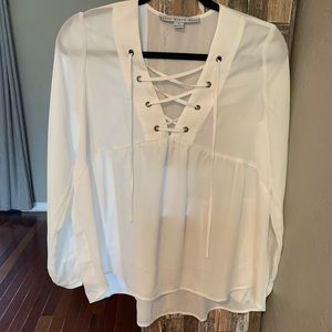 Elegant sexy sheer white lace up blouse